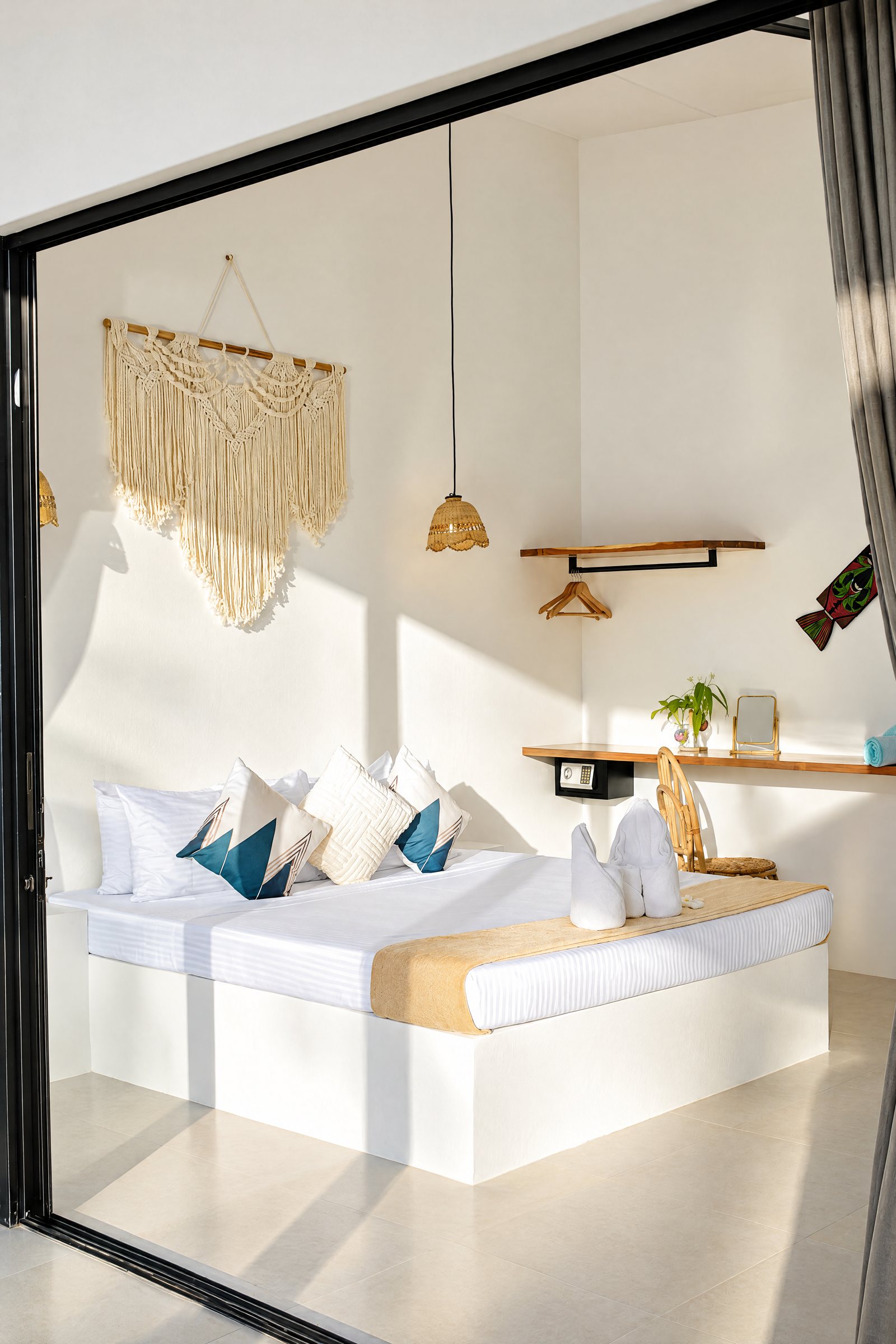 Suite three framed by black steel doors